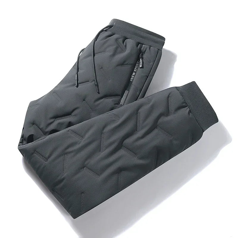 Waterproof winter down ski pants in black, designed for cold weather and outdoor activities.
