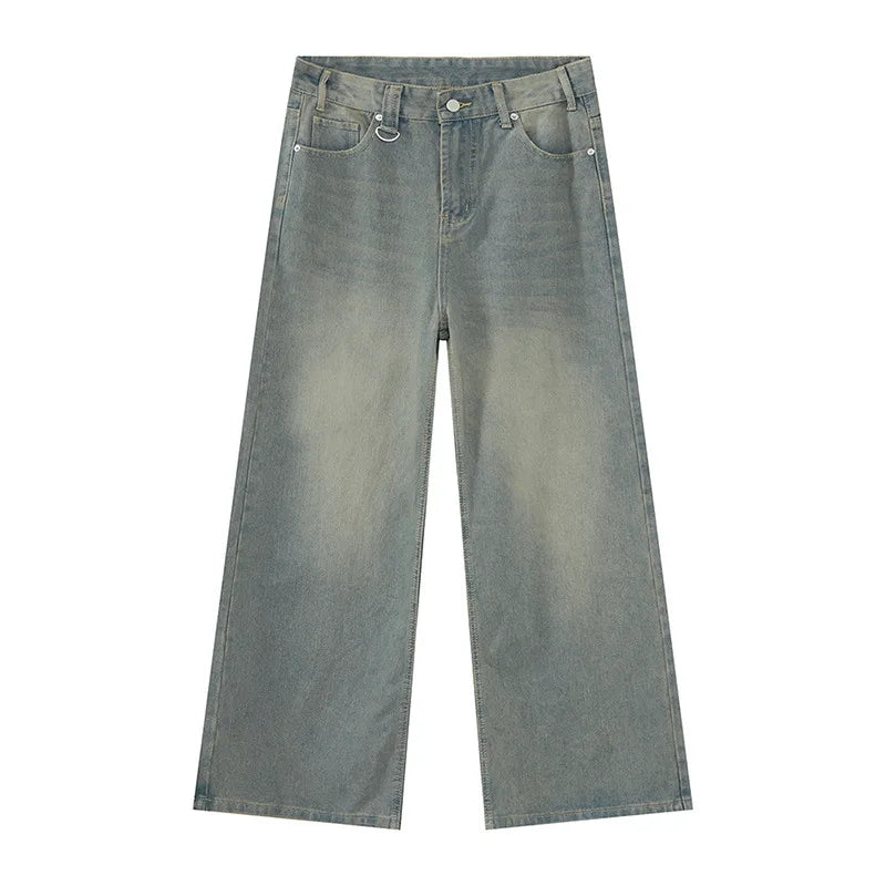 old blue washed denim pants displayed flat. Vintage style wide-leg jeans for casual wear.