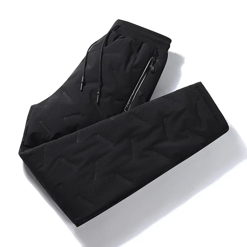 Waterproof black winter down ski pants designed for cold weather performance and comfort.