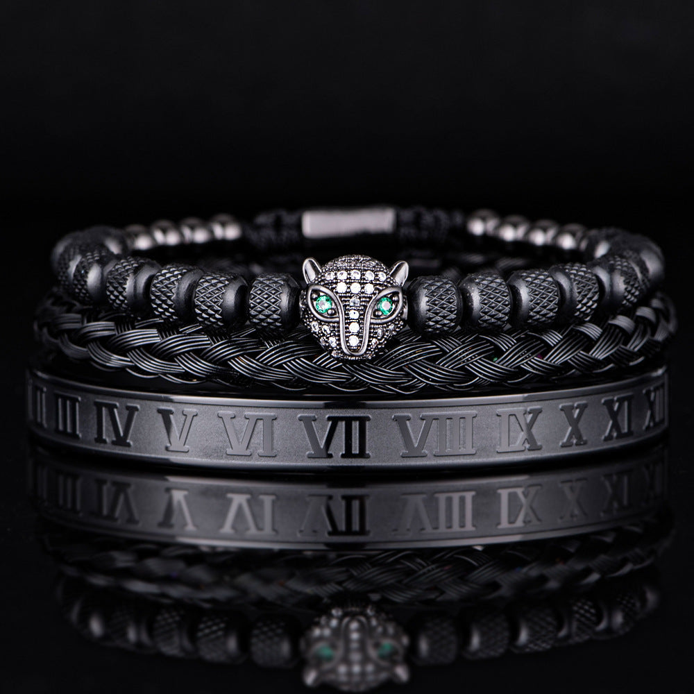 Black braided bracelet set with animal head, featuring green gems and engraved Roman numerals for unisex fashion.