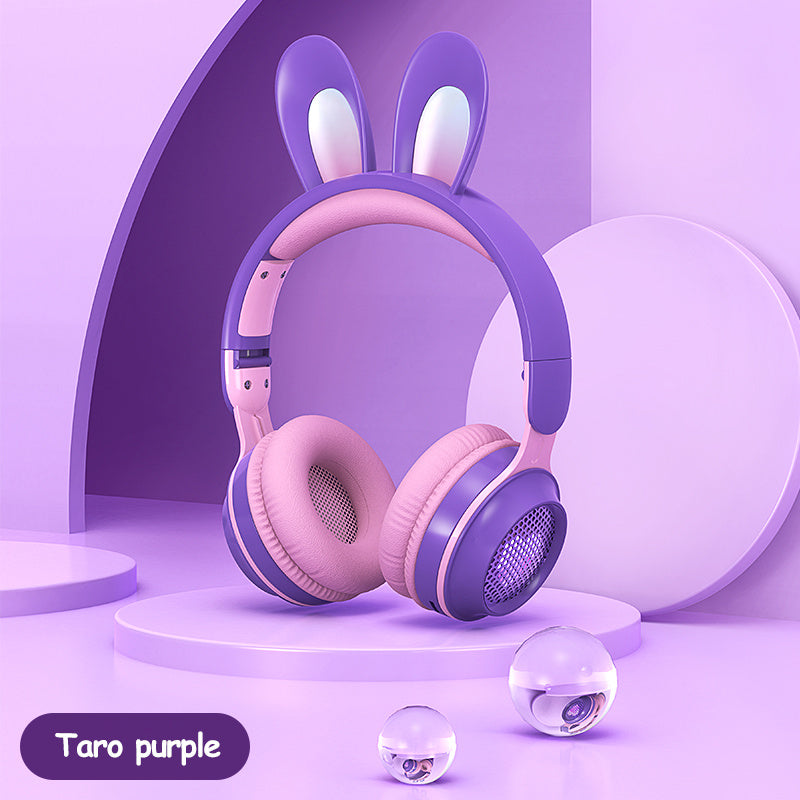 Wireless rabbit ear headphones in Taro purple with soft pink accents, designed for comfort and style in music and calls.