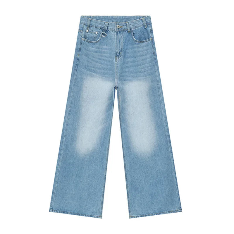 old blue washed denim pants on a white background showcasing wide leg and loose fit design.