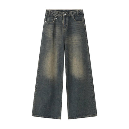 old blue washed denim pants front view showcasing wide leg design and vintage wash finish.