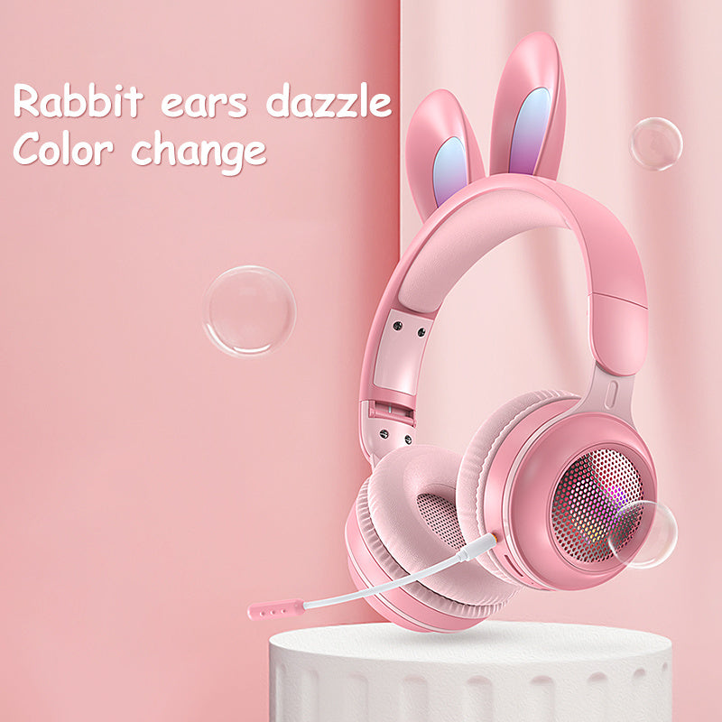 Wireless rabbit ear headphones in pink with color-changing lights and adjustable design for stylish audio experience.