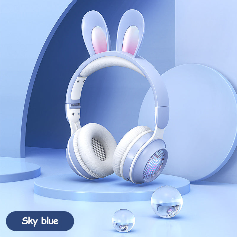 Wireless rabbit ear headphones in sky blue with white padding, featuring a playful design and luminous accents.