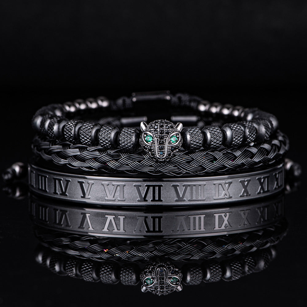 Leopard head set bracelet in black with emerald eyes and Roman numeral accents, perfect for unisex gifting.